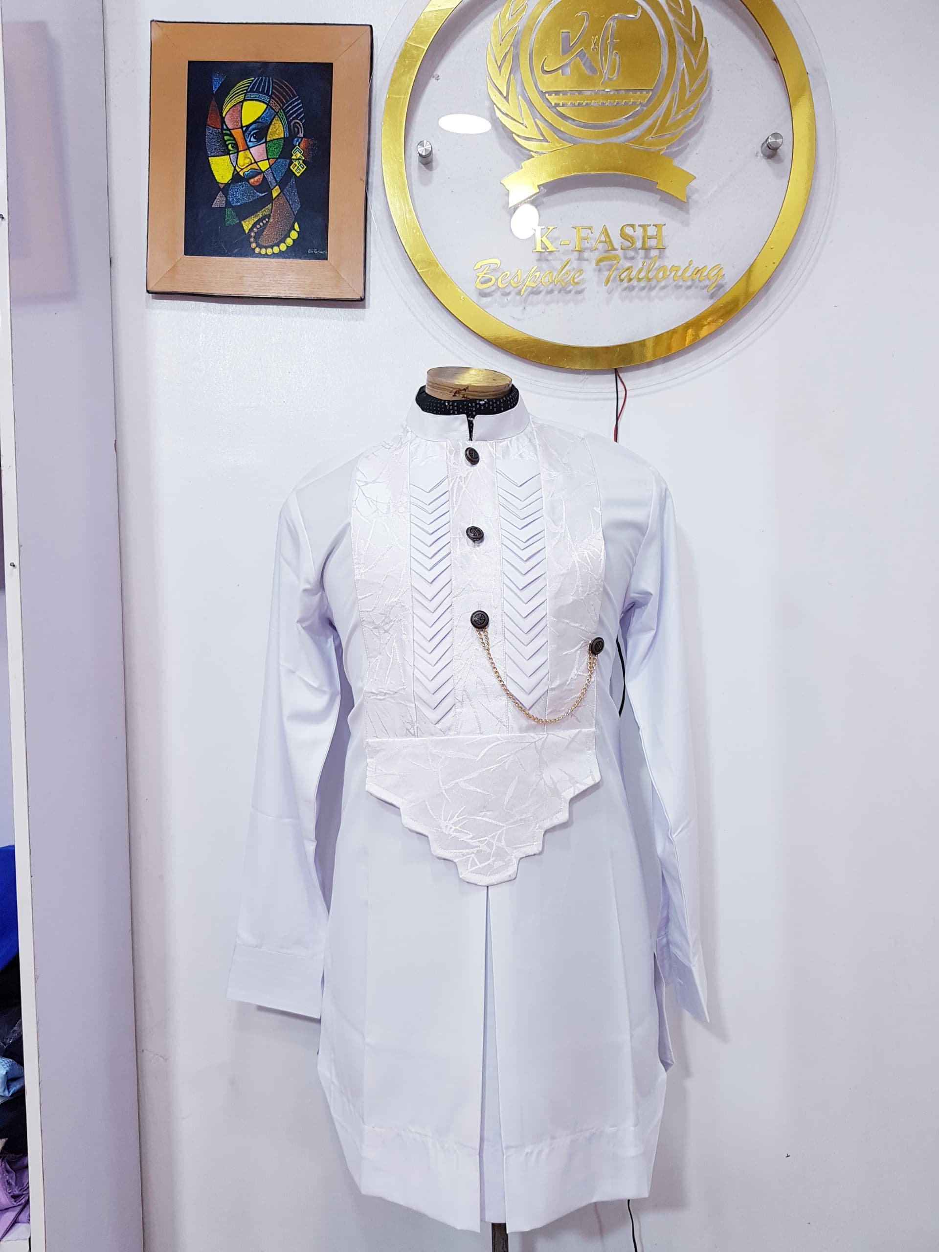 A white men Etibo with silver accorise detailing